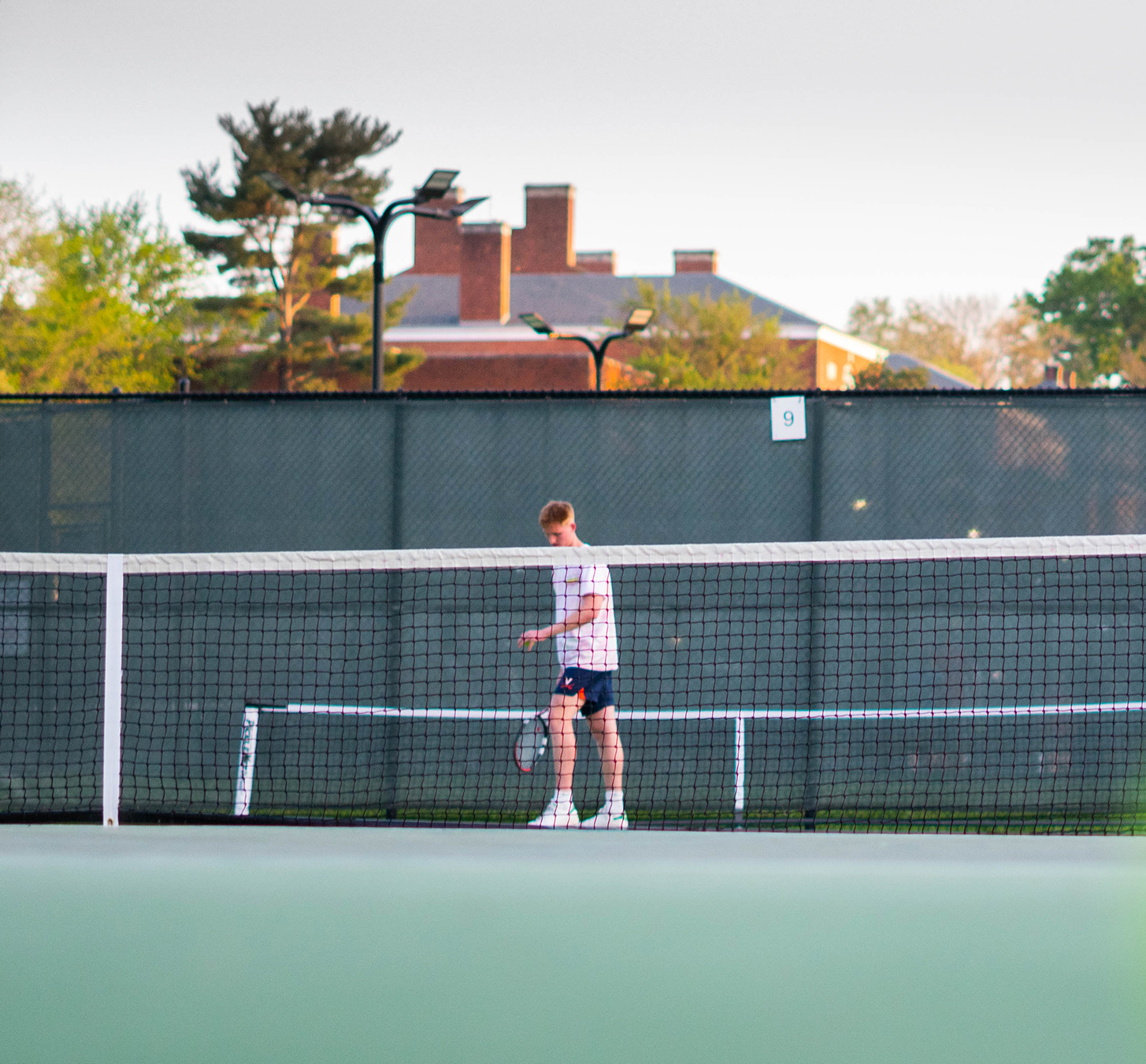 Person Playing tennis at Snyder Courts