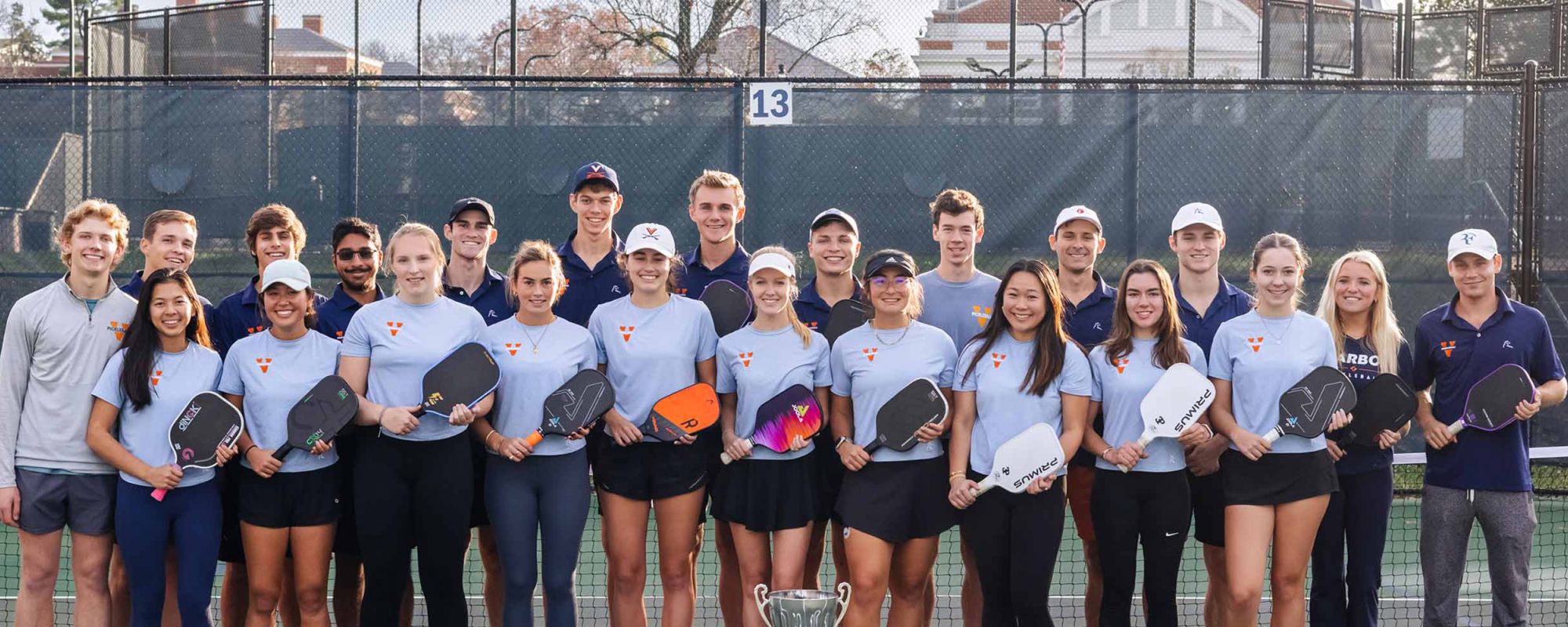 UVA Pickleball Club posing for a picture on the courts