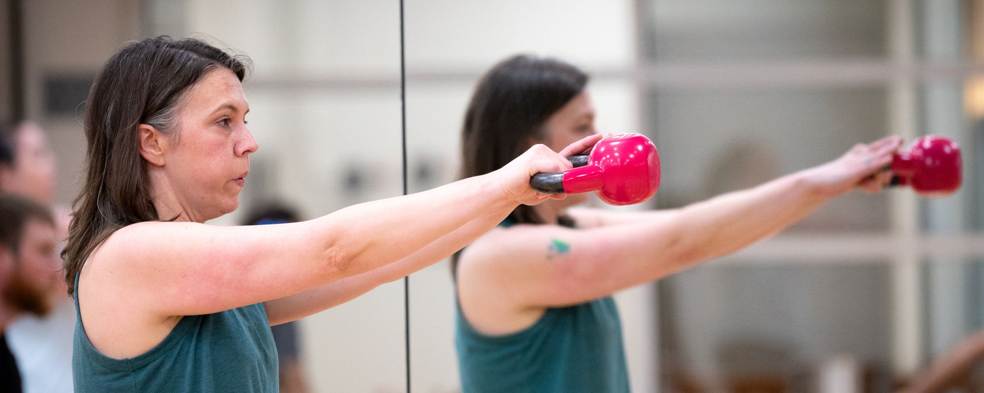 Hoos Well member taking a kettlebell class