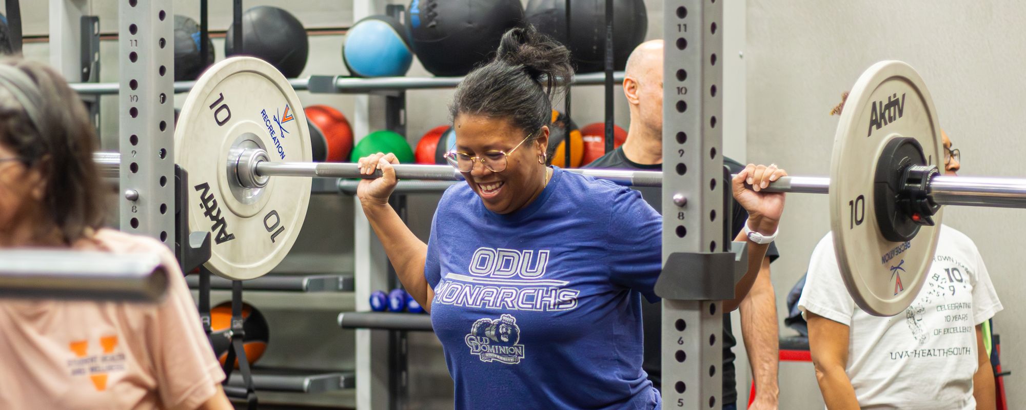 Staff Member lifting weights