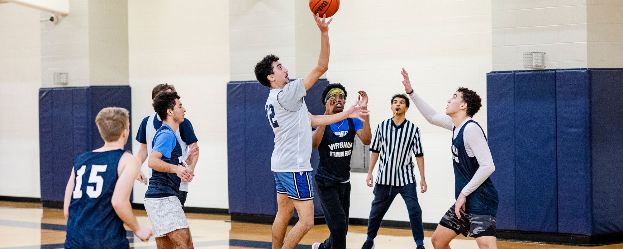 Referee refereeing a basketball game