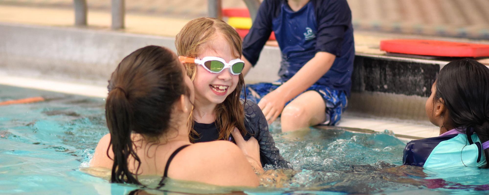 A youth enjoying a swim in the AFC pool